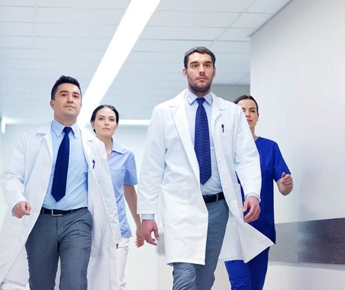group-of-medics-walking-along-hospital-P92EJ7V-1.jpg
